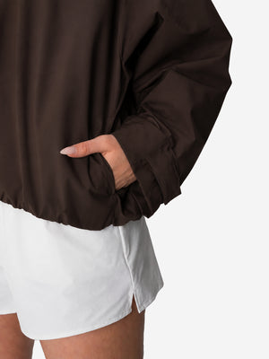 Women's Oversized Waterproof Rain Jacket with Hood & Pleated Hem